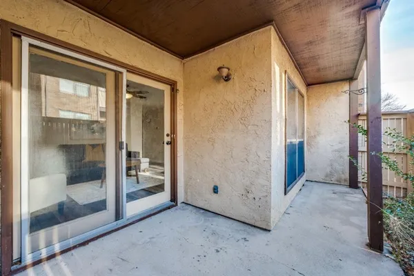 a view of a bathroom with a glass door