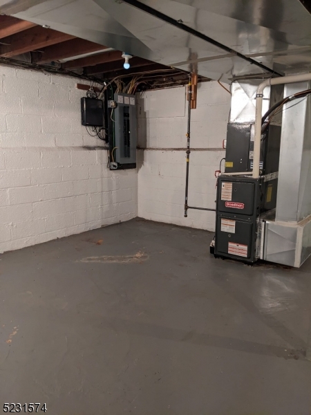 155 Locust Drive Union, NJ 07083 - Photo 19 of 24 a view of a room with gym equipment