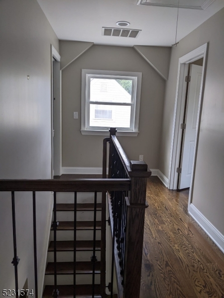155 Locust Drive Union, NJ 07083 - Photo 22 of 24 a view of entryway and hall with wooden floor