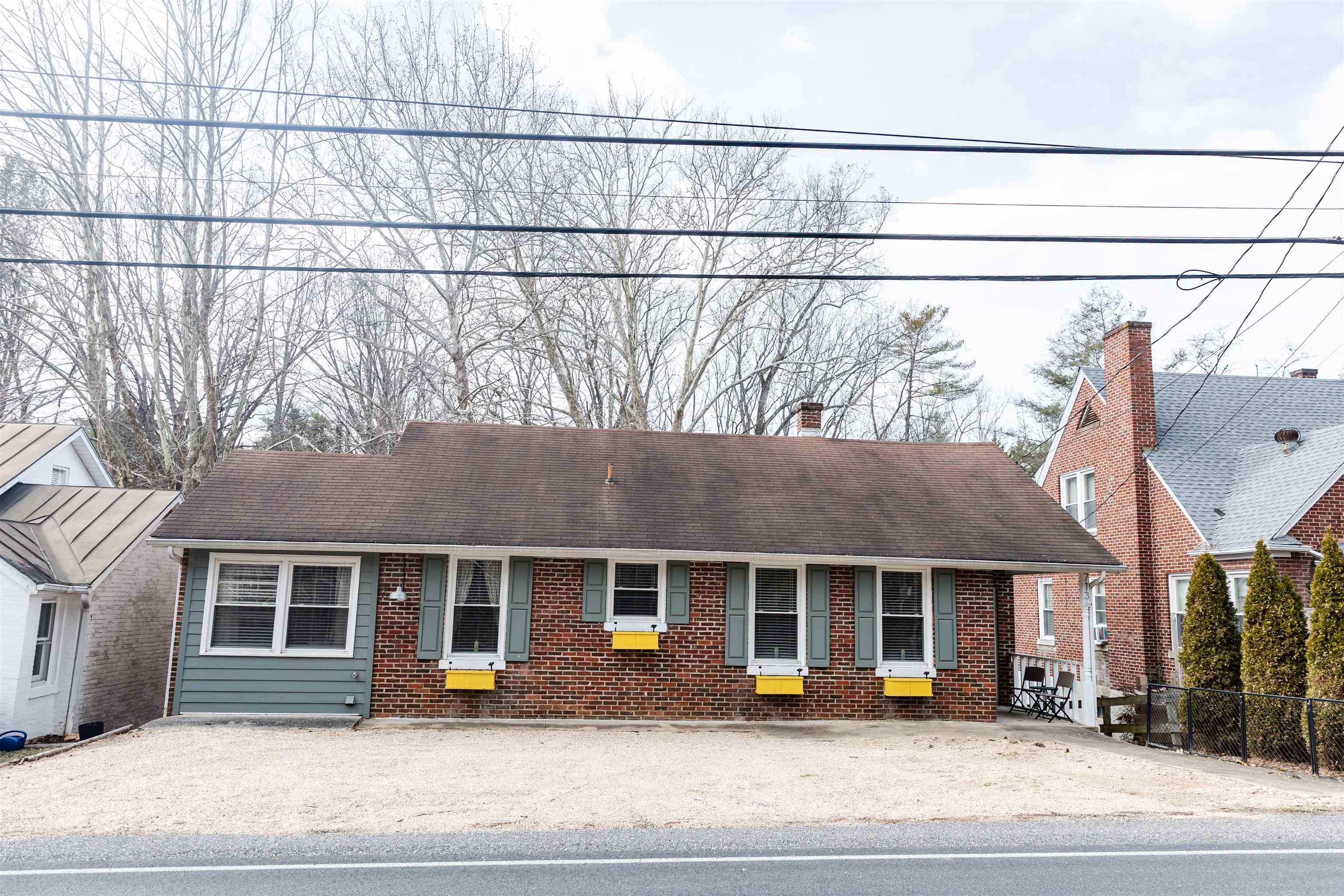 713 Thorn Hill Road Lexington, VA 24450 - Photo 1 of 45 a view of a house with a patio
