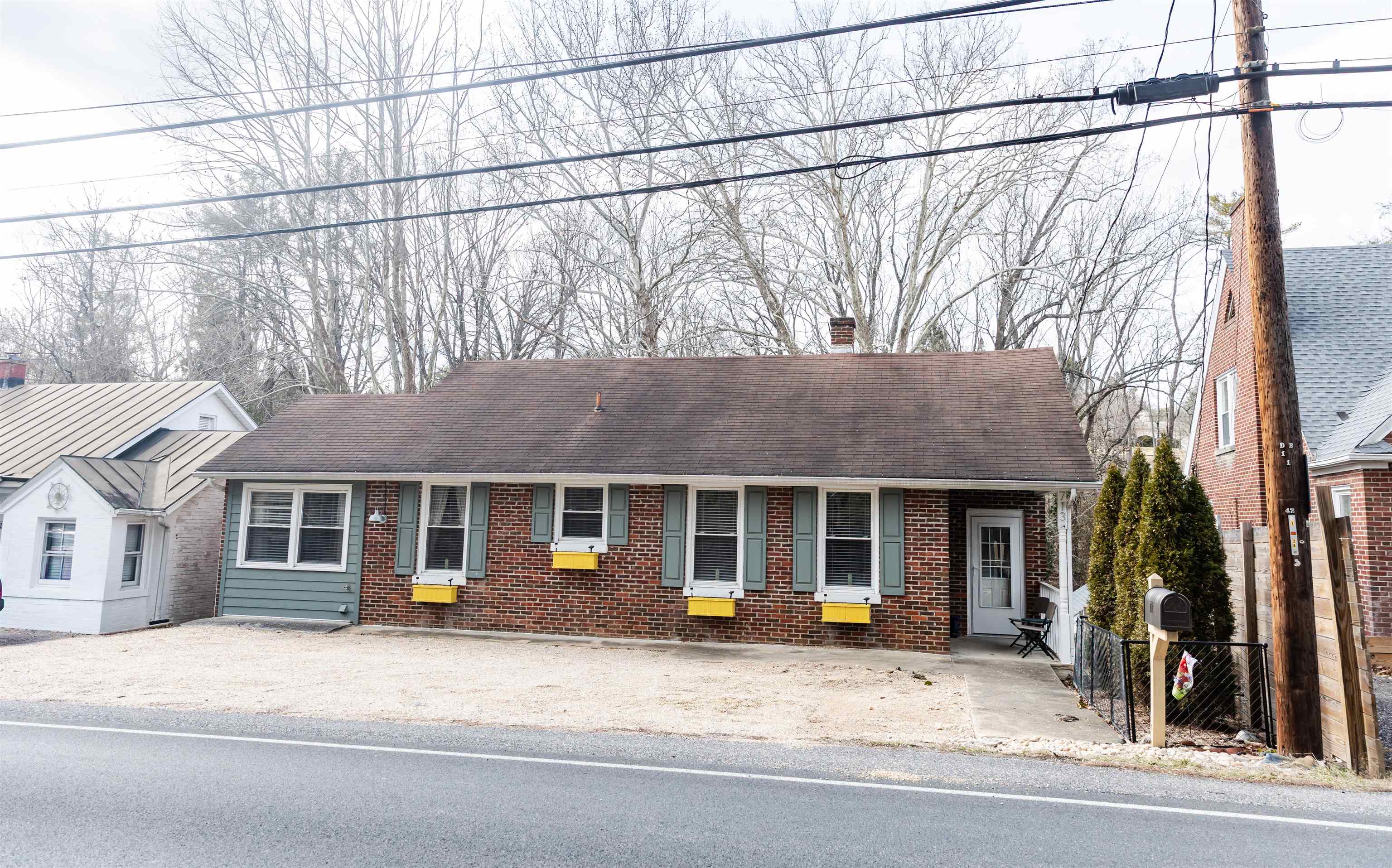 713 Thorn Hill Road Lexington, VA 24450 - Photo 2 of 45 a view of a house with a patio and a yard