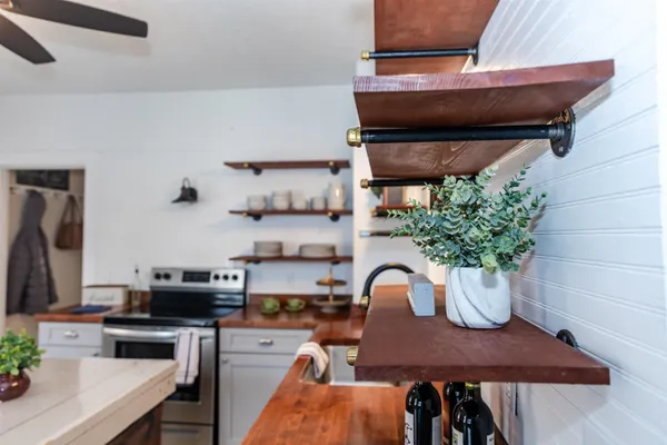 a view of a workspace with furniture