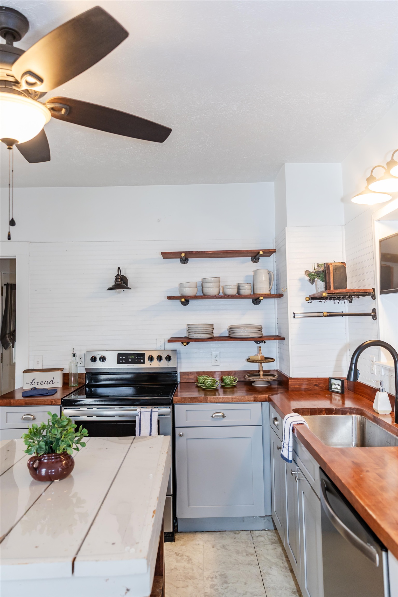 713 Thorn Hill Road Lexington, VA 24450 - Photo 10 of 45 a kitchen with kitchen island stainless steel appliances a sink and stove