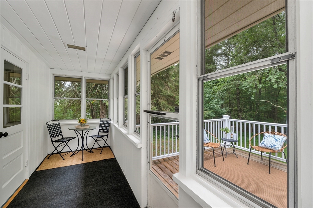 104 Kensington Road Hampton Falls, NH 03844 - Photo 14 of 42 a view of a two chairs in the balcony