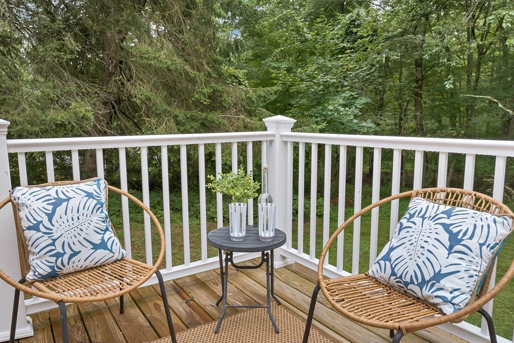104 Kensington Road Hampton Falls, NH 03844 - Photo 16 of 42 a view of balcony with two chairs