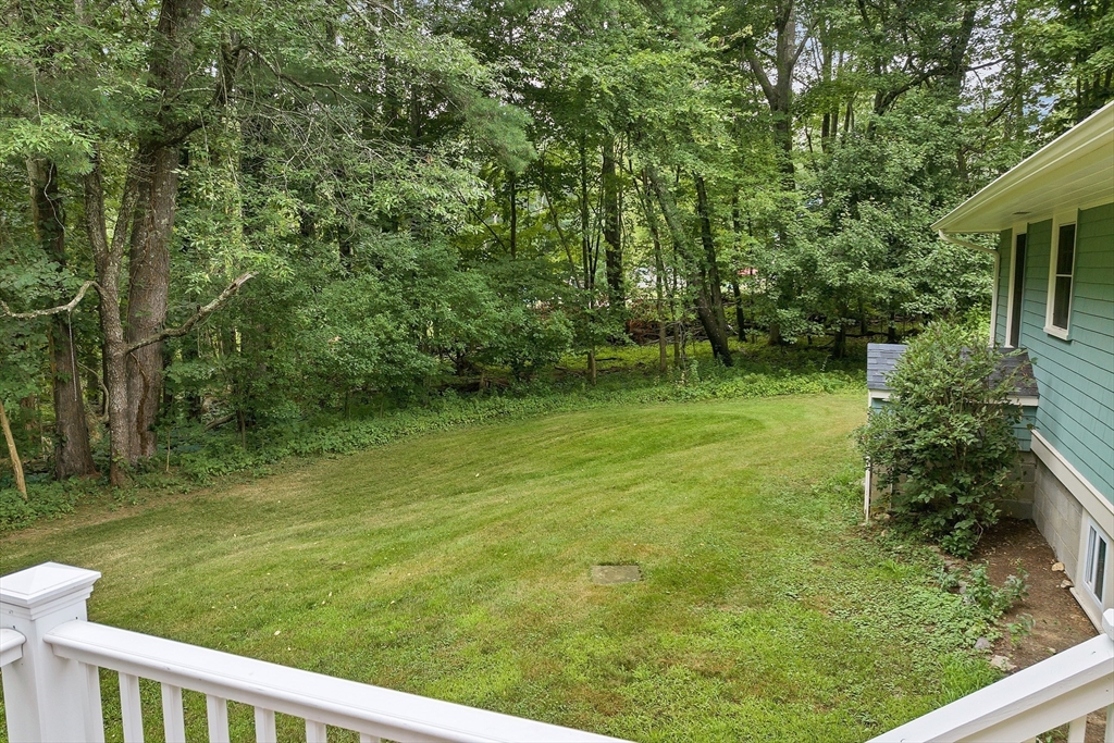 104 Kensington Road Hampton Falls, NH 03844 - Photo 17 of 42 a view of a backyard with a garden