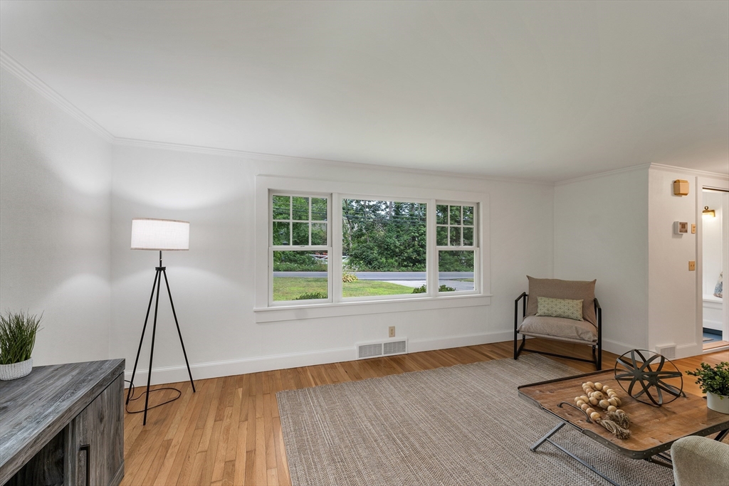 104 Kensington Road Hampton Falls, NH 03844 - Photo 22 of 42 a living room with furniture and a window