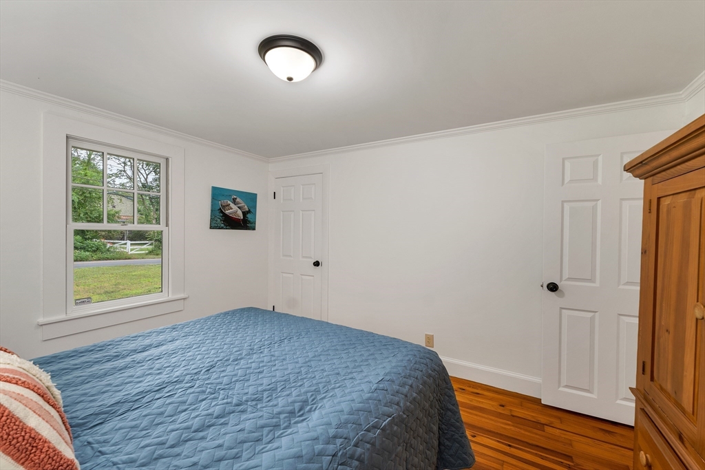 104 Kensington Road Hampton Falls, NH 03844 - Photo 25 of 42 a view of empty room with wooden floor and fan