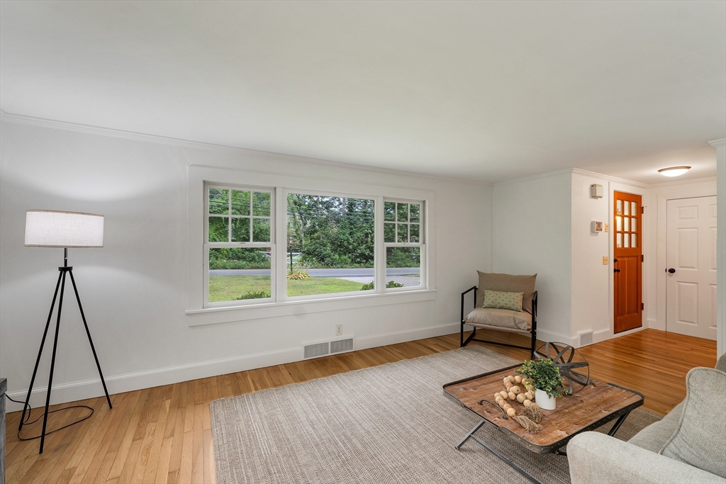 104 Kensington Road Hampton Falls, NH 03844 - Photo 6 of 42 a living room with furniture and a window