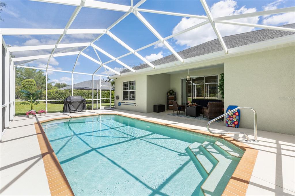 19639 Southwest 77th Loop Dunnellon, FL 34432 - Photo 47 of 59 a room with lots of windows and potted plants