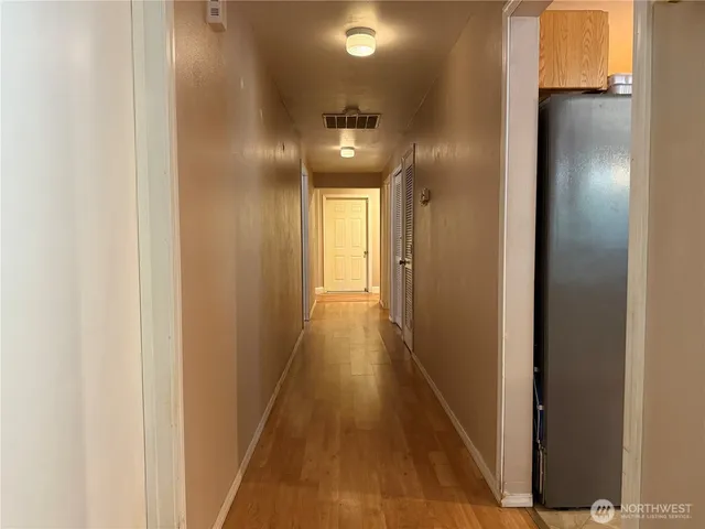 a view of hallway with stairs