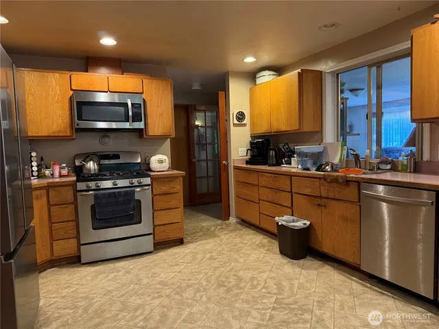 a kitchen with a sink and counter top space
