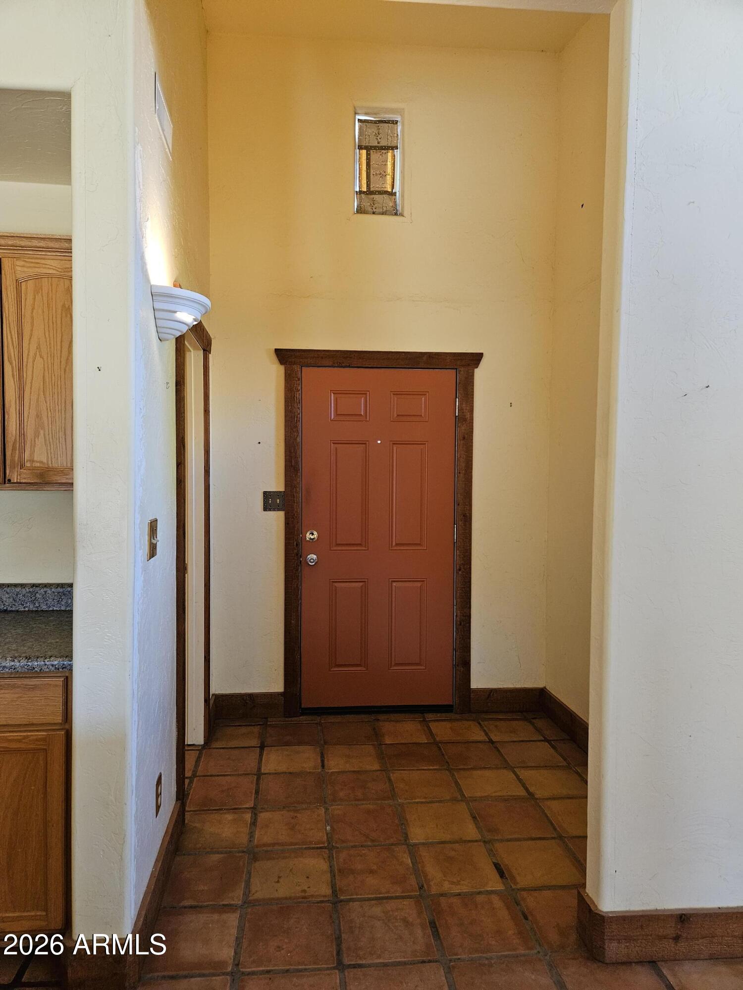 4105 North Washington Avenue Douglas, AZ 85607 - Photo 6 of 61 a view of a hallway with wooden cabinets