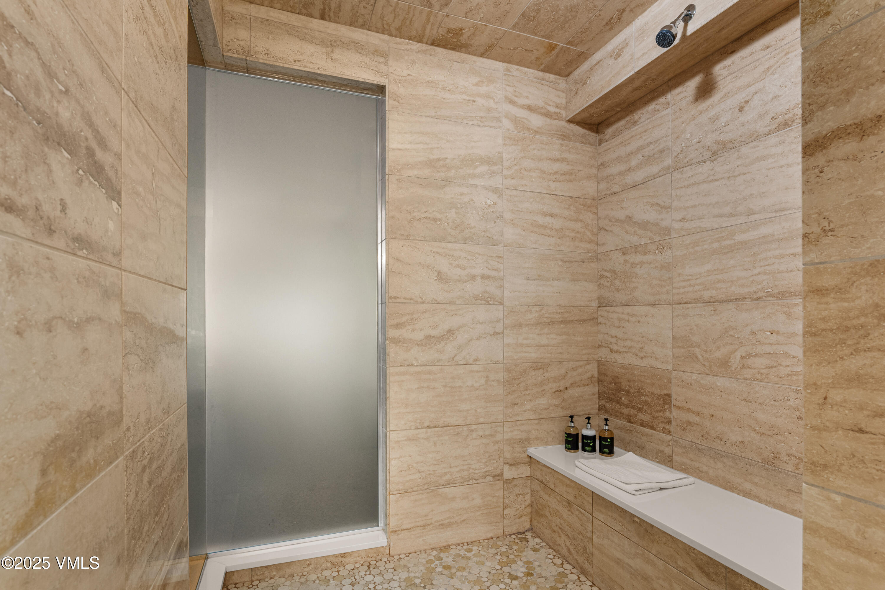 311 Offerson Road, Unit 223 Beaver Creek, CO 81620 - Photo 18 of 37 a bathroom with a bathtub and shower