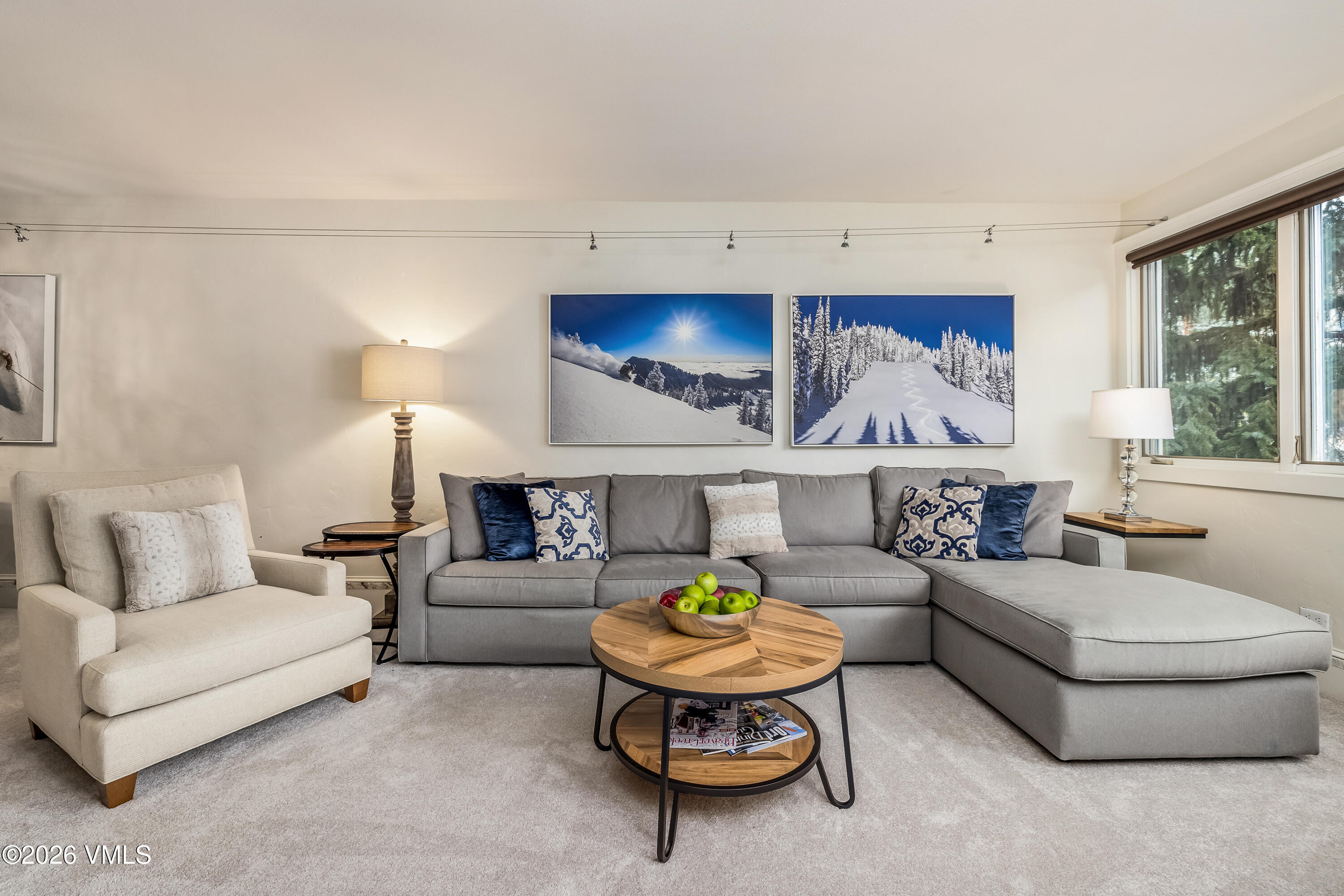 311 Offerson Road, Unit 223 Beaver Creek, CO 81620 - Photo 3 of 37 a living room with furniture and a table