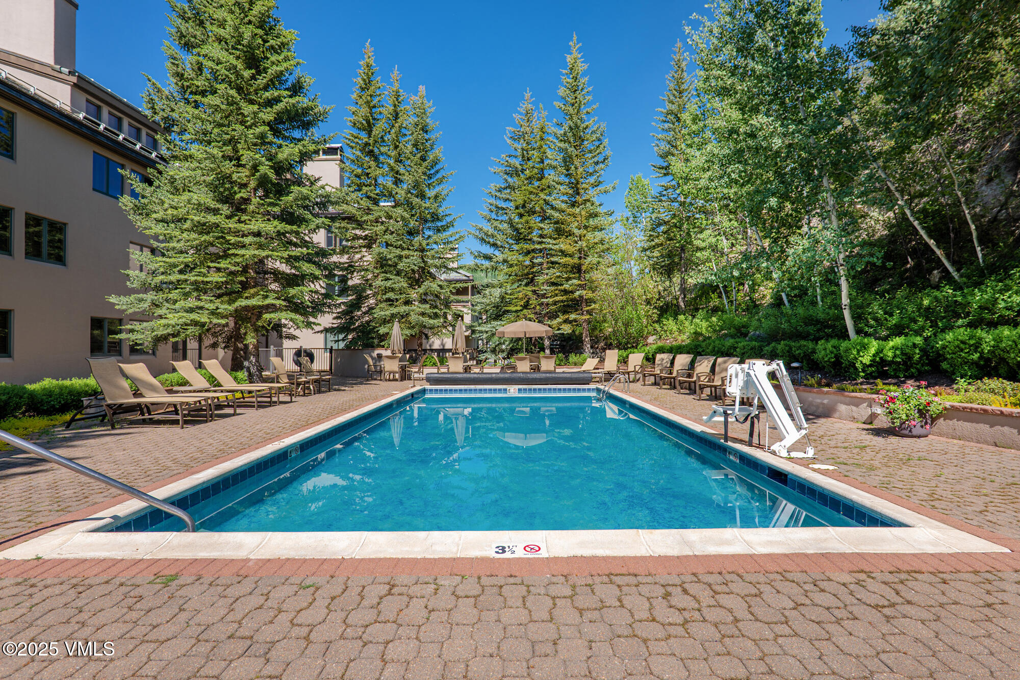311 Offerson Road, Unit 223 Beaver Creek, CO 81620 - Photo 33 of 37 a view of swimming pool with chairs