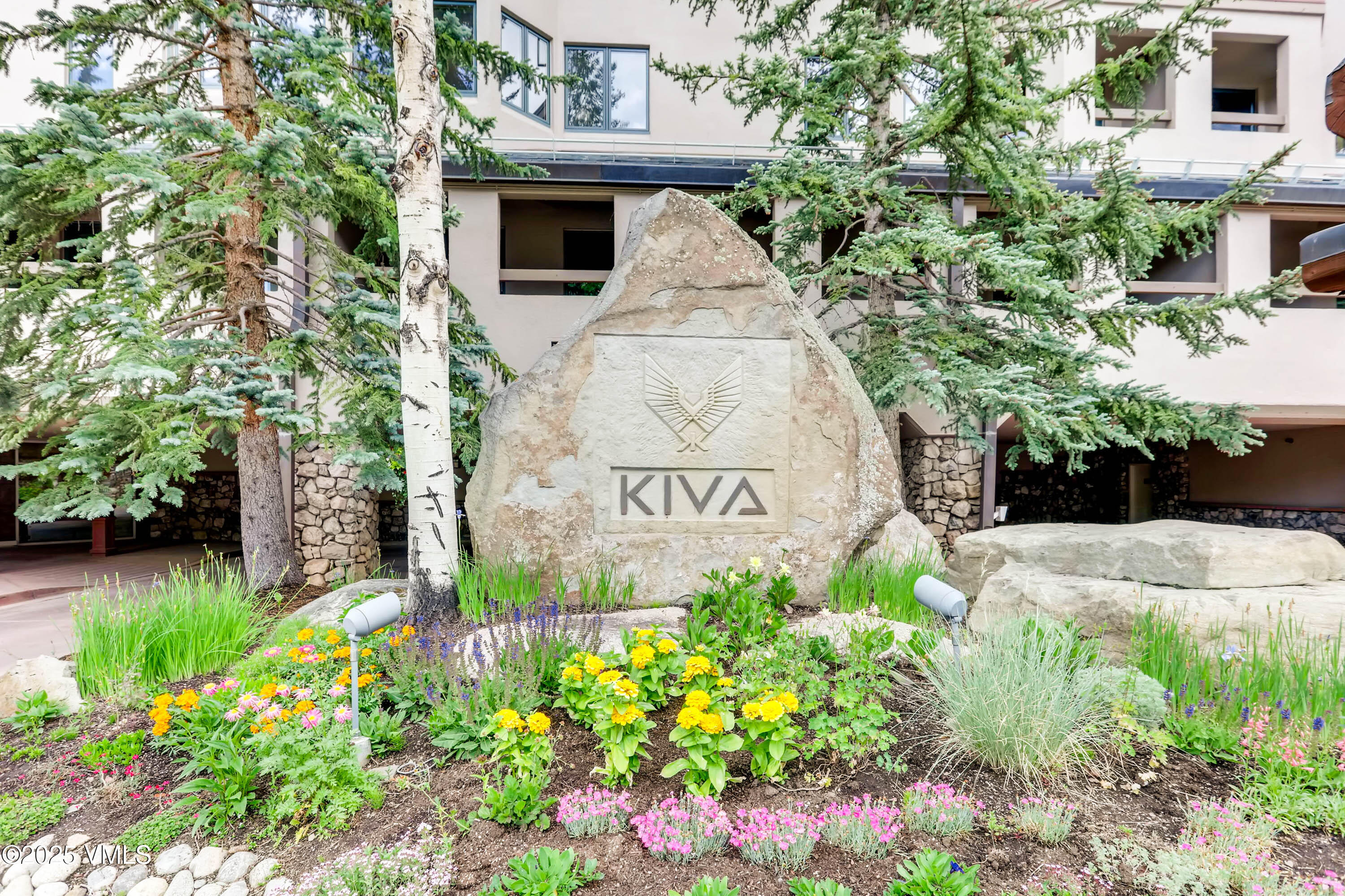 311 Offerson Road, Unit 223 Beaver Creek, CO 81620 - Photo 36 of 37 a view of a garden with a fountain