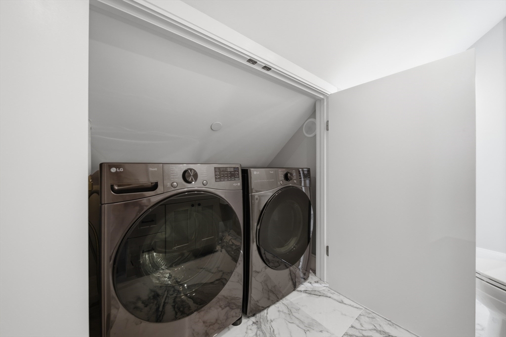 174 Walnut Street, Unit 3 Somerville, MA 02145 - Photo 36 of 38 a utility room with washing machine
