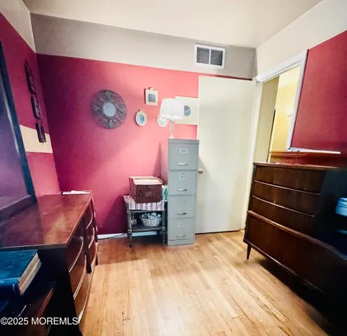 a room with furniture and a window