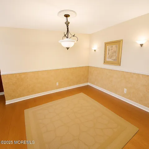 a view of empty room with windows