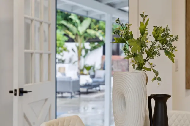 a view of a gate and a window