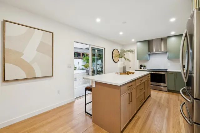 a bedroom with a bed and a table