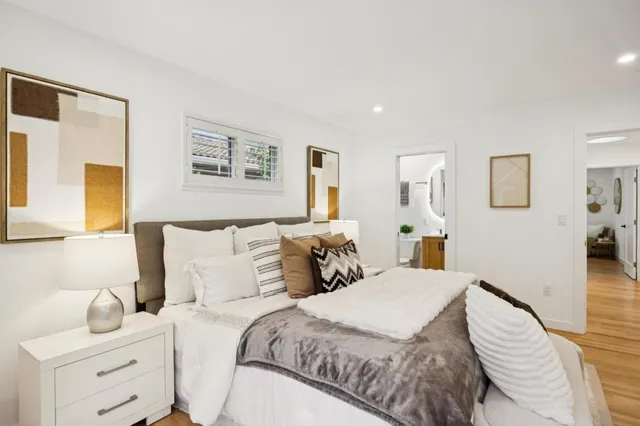 a view of a patio with couches chairs and potted plants