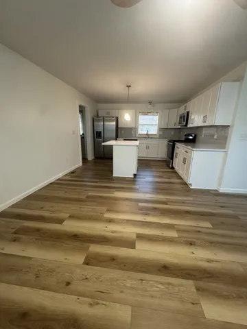 a view of kitchen and sink