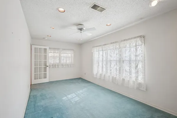 a view of a livingroom with wooden floor