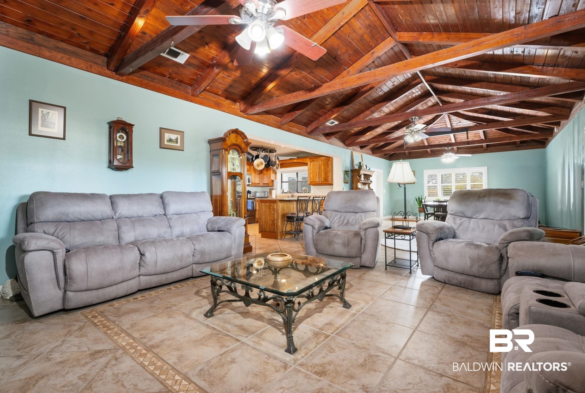 15025 Bellingrath Road Coden, AL 36523 - Photo 36 of 79 Living room with ceiling fan and a wooden ceiling with exposed beams