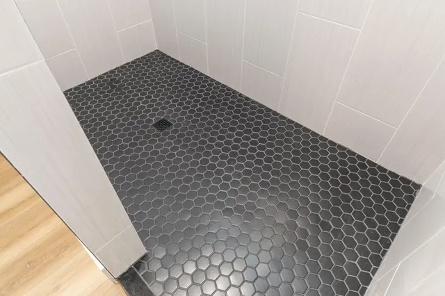 a view of room with racks on the wall