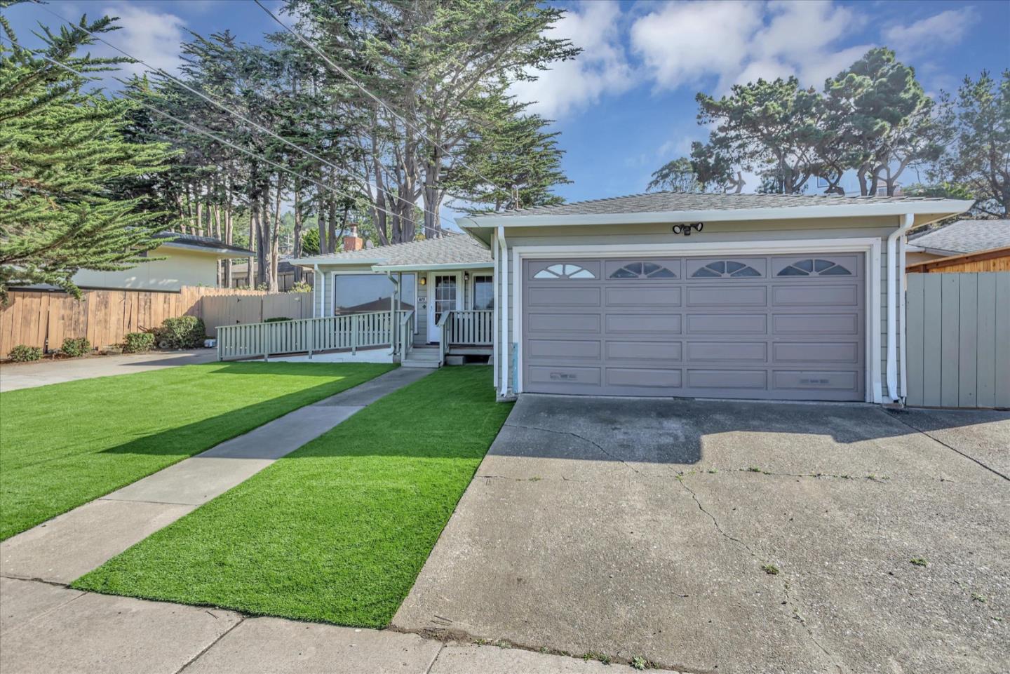 675 Crespi Drive Pacifica, CA 94044 - Photo 2 of 55 front view of a house with a yard