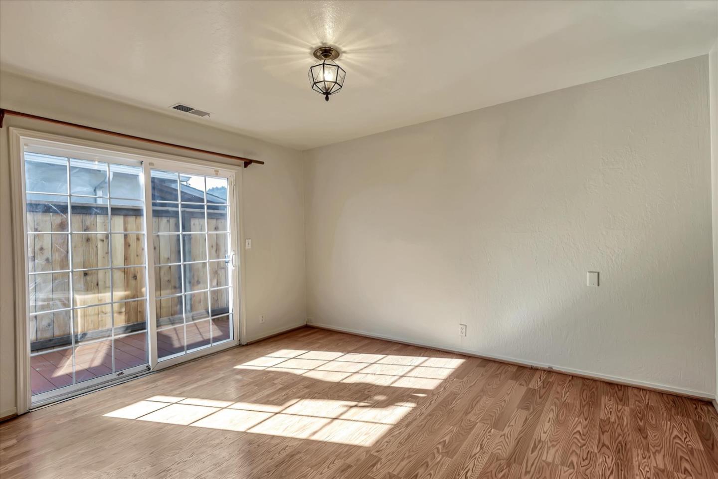 675 Crespi Drive Pacifica, CA 94044 - Photo 23 of 55 a view of empty room with a window