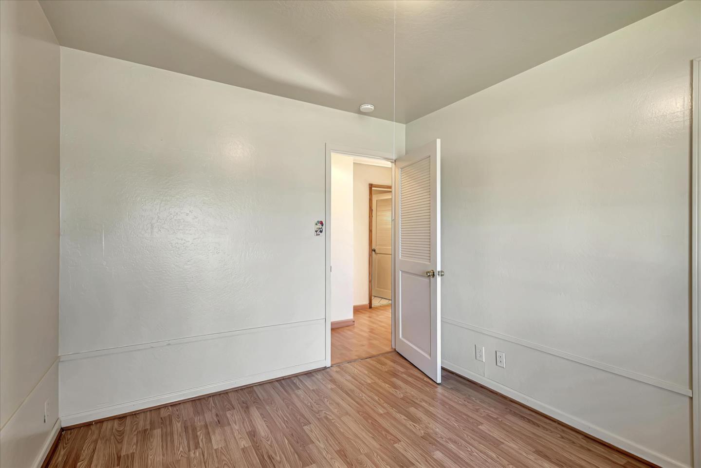 675 Crespi Drive Pacifica, CA 94044 - Photo 31 of 55 wooden floor in an empty room