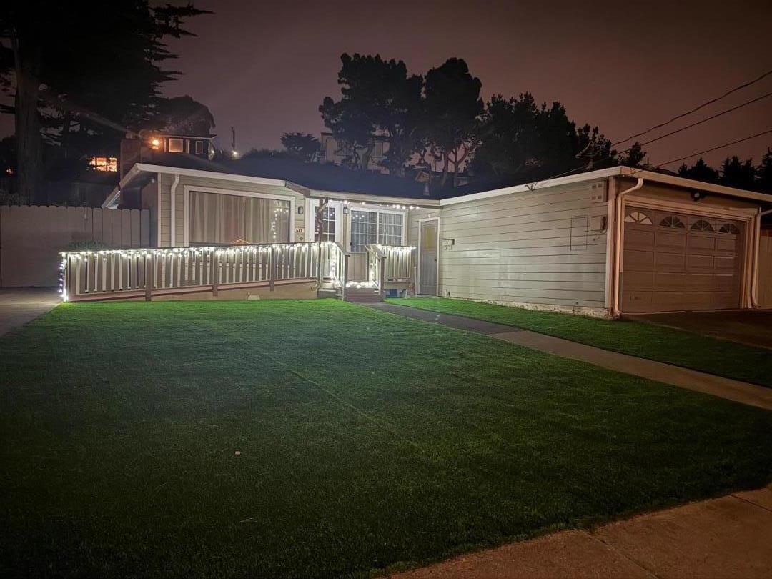 675 Crespi Drive Pacifica, CA 94044 - Photo 54 of 55 a backyard of a house with lots of green space and outdoor seating