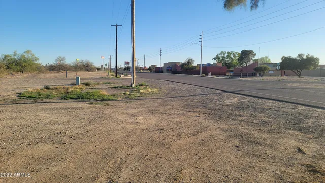 a view of a road with a yard