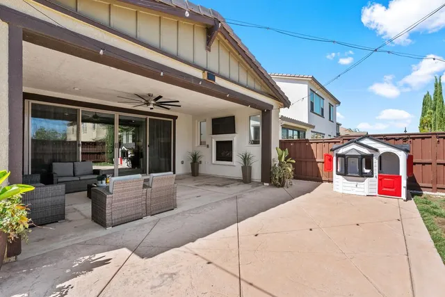 a view of a building with sitting area
