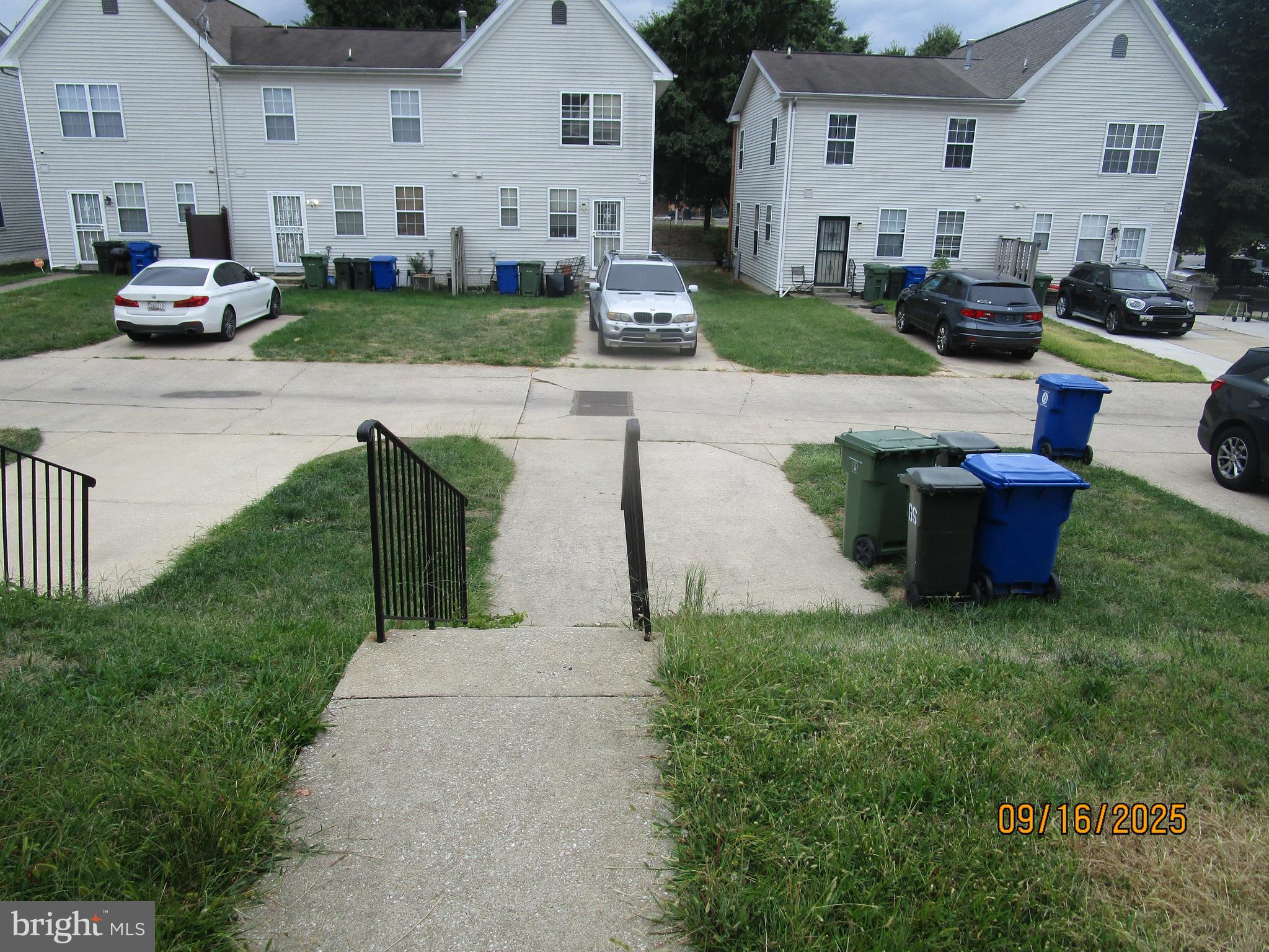811 George Street Baltimore, MD 21201 - Photo 17 of 20 a view of a patio with couches and a fire pit and wooden fence