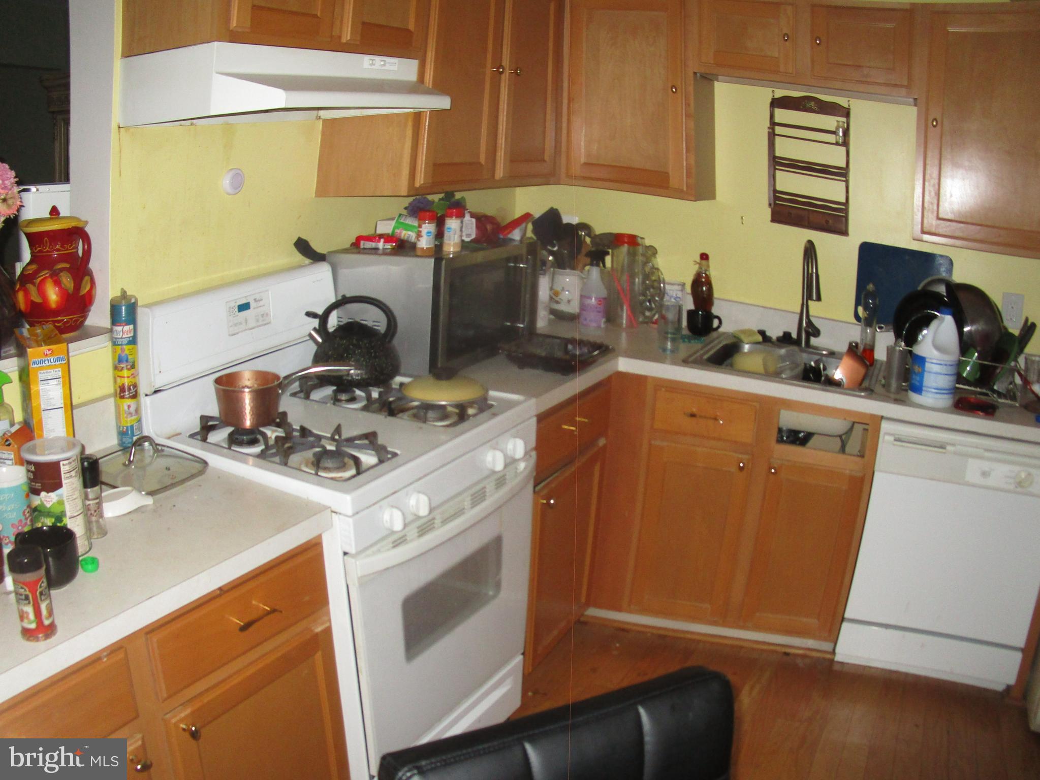 811 George Street Baltimore, MD 21201 - Photo 7 of 20 a kitchen with a sink a stove and cabinets
