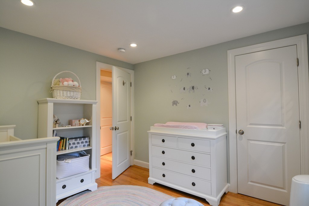 15 Melvin Road Arlington, MA 02474 - Photo 18 of 26 a view of cabinets with wooden floor and cabinet