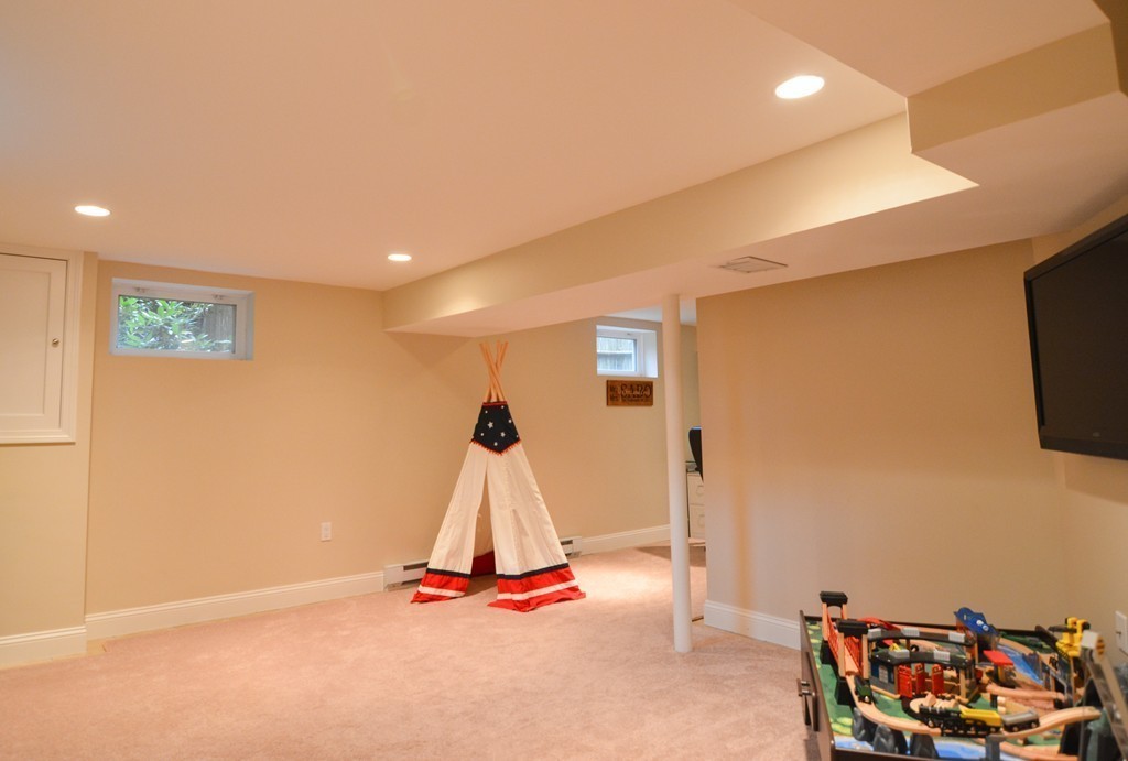 15 Melvin Road Arlington, MA 02474 - Photo 19 of 26 a view of a room with gym equipment
