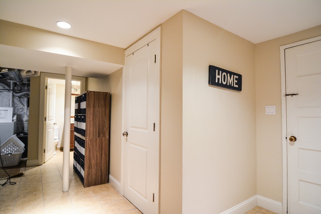 15 Melvin Road Arlington, MA 02474 - Photo 22 of 26 a view of walk in closet with window
