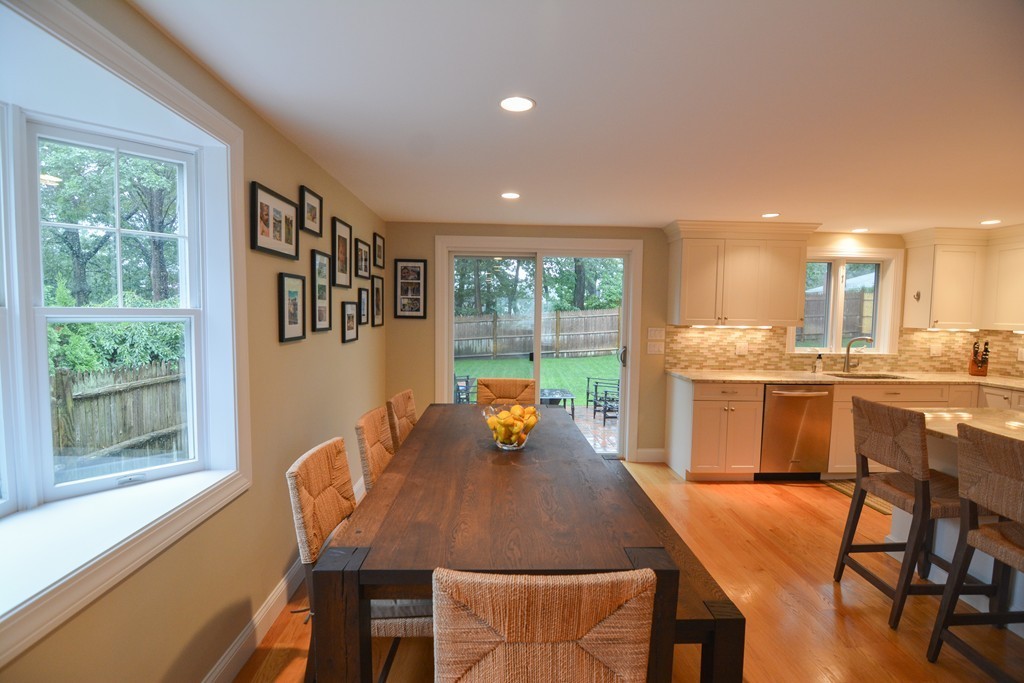 15 Melvin Road Arlington, MA 02474 - Photo 5 of 26 a dining room with furniture and a large window