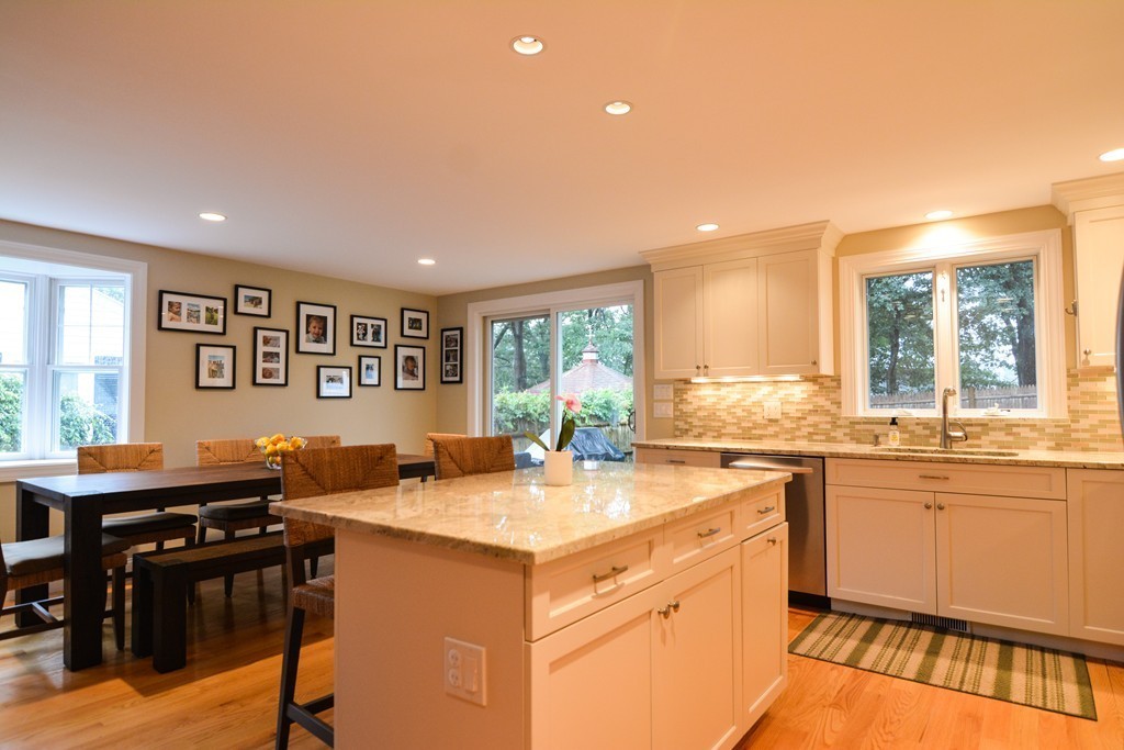 15 Melvin Road Arlington, MA 02474 - Photo 8 of 26 a kitchen with a sink stove and cabinets