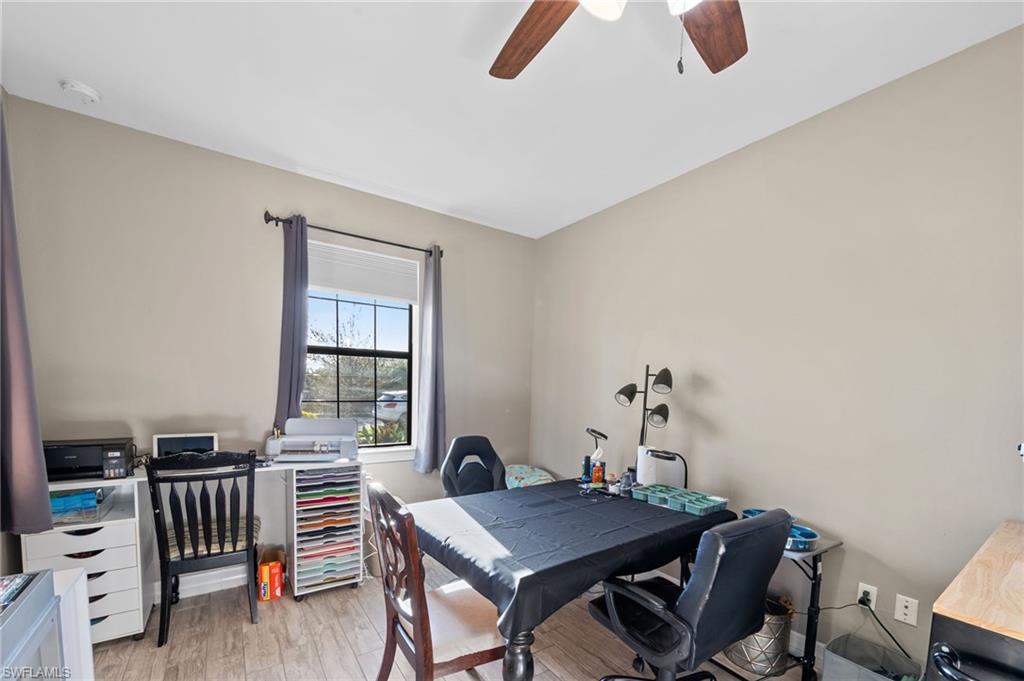 4914 Seton Way Immokalee, FL 34142 - Photo 18 of 46 Office space with light wood-style flooring and ceiling fan