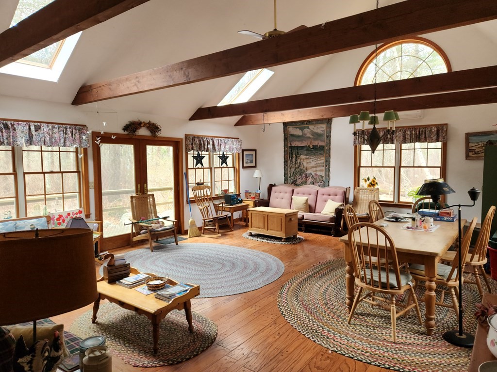 2 Sassamon Trail Marion, MA 02738 - Photo 7 of 10 a living room with furniture and a floor to ceiling window
