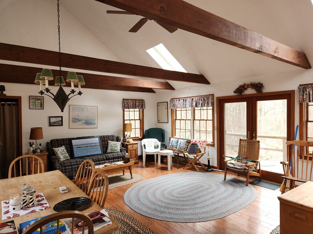 2 Sassamon Trail Marion, MA 02738 - Photo 8 of 10 a room with lots of furniture and a chandelier