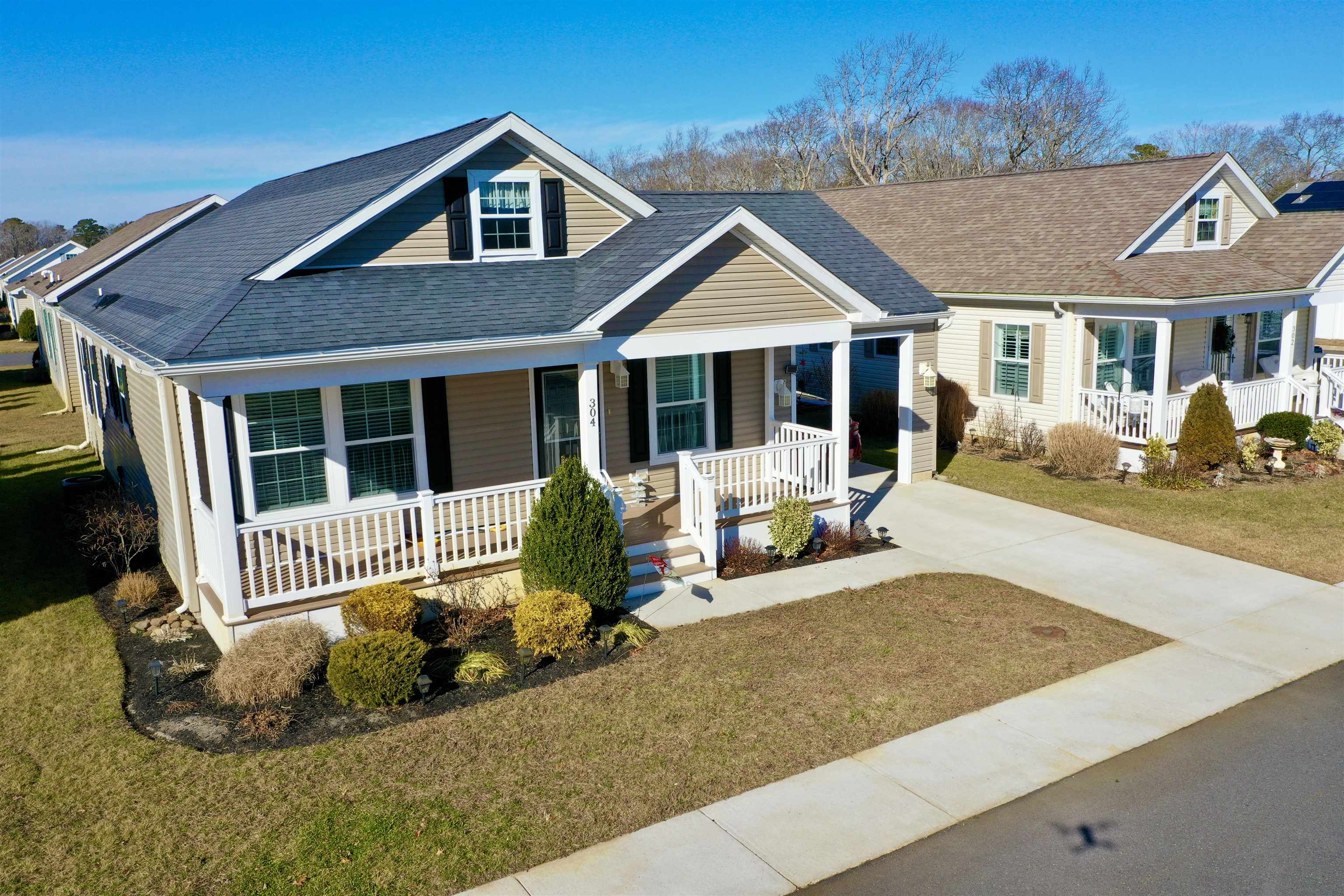 2058 Shore Road Seaville, NJ 08230 - Photo 3 of 36 a front view of a house with a porch