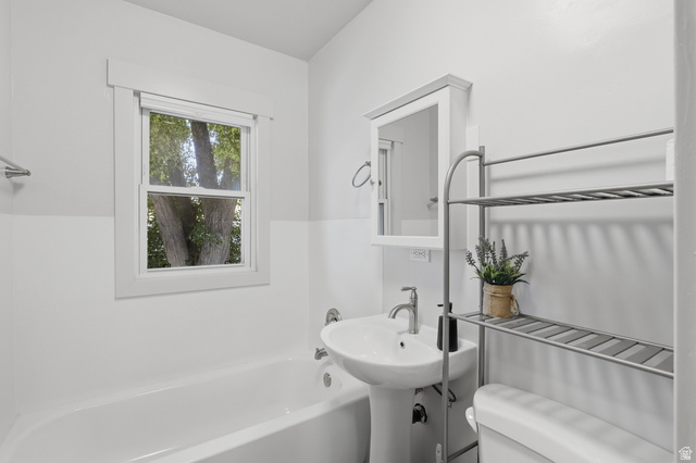 85 North 800 West Provo, UT 84601 - Photo 11 of 25 Bathroom featuring a white pedestal sink with a chrome faucet, a white medicine cabinet, and a window with white trim