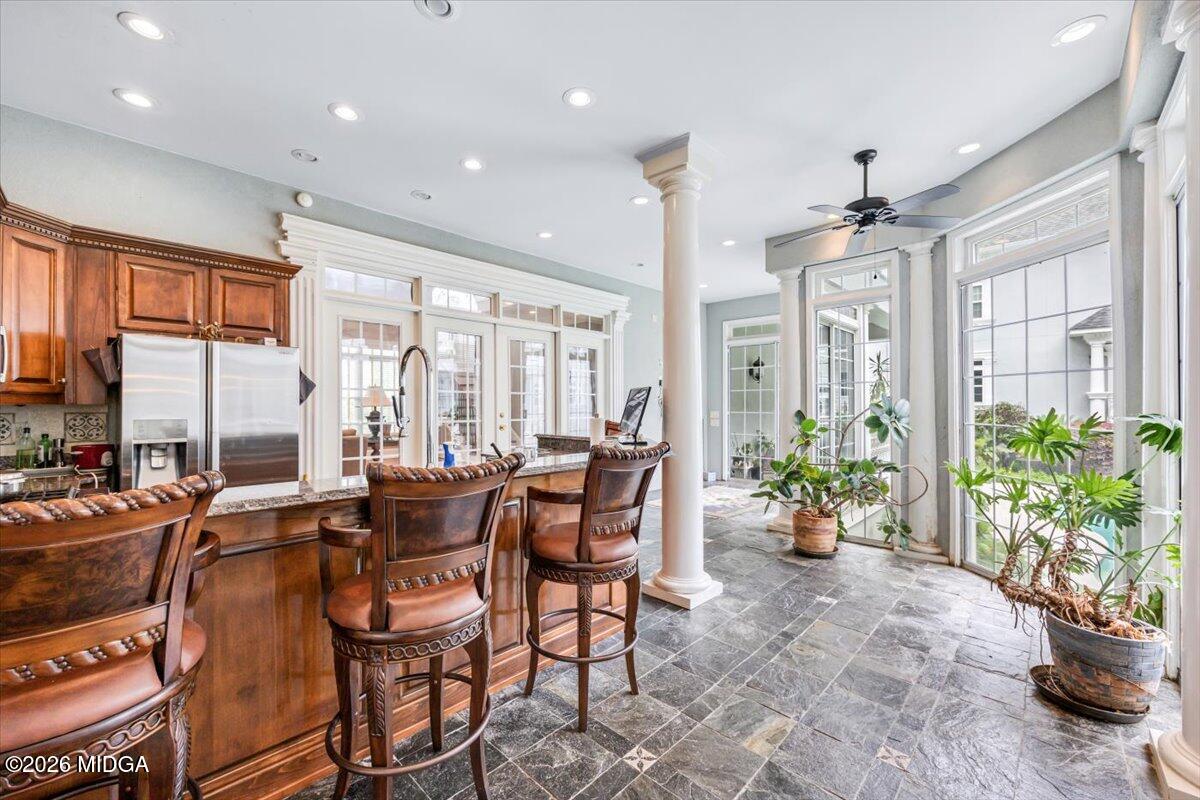 311 North Rivoli Farms Drive Macon, GA 31210 - Photo 18 of 79 a view of a dining room with furniture window and outdoor view